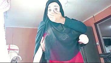 Muslim stepmother in a hijab fucking in the kitchen